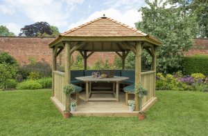 Forest Garden 4m Hexagonal Wooden Garden Gazebo with Cedar Roof - Furnished with Table, Benches and Cushions (Green)