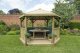 Forest Garden 4m Hexagonal Wooden Garden Gazebo with Timber Roof - Furnished with Table, Benches and Cushions (Green)